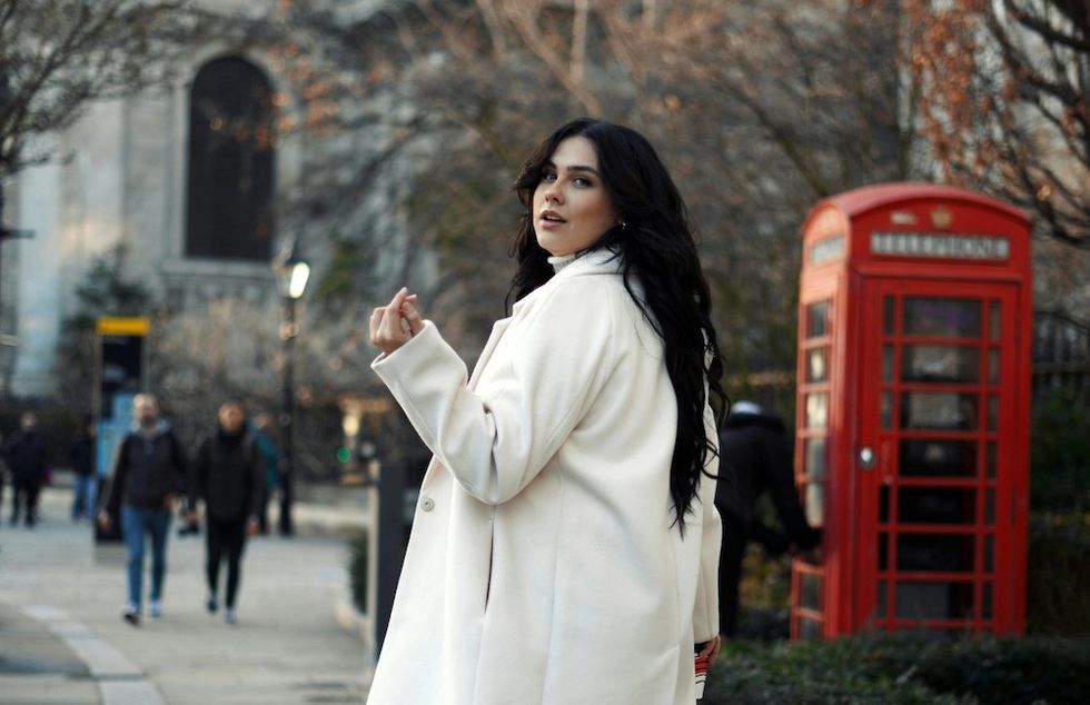 a woman walking around london