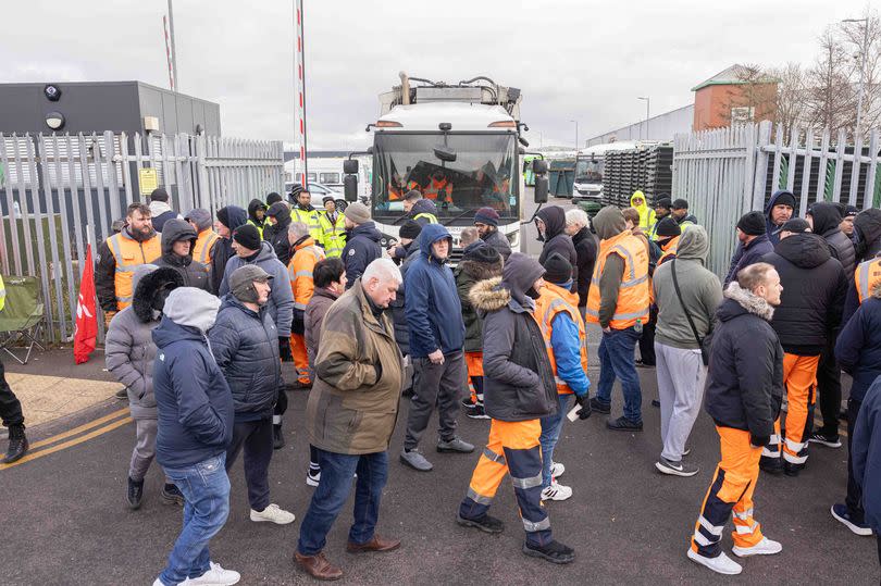 Striking bin men walked in front of bin lorries leaving Birmingham City Council's depot in Redfern Road in Tyseley