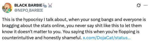 Tweet criticizes an artist for caring about stats only when their music isn't popular, calling it hypocritical and shameful