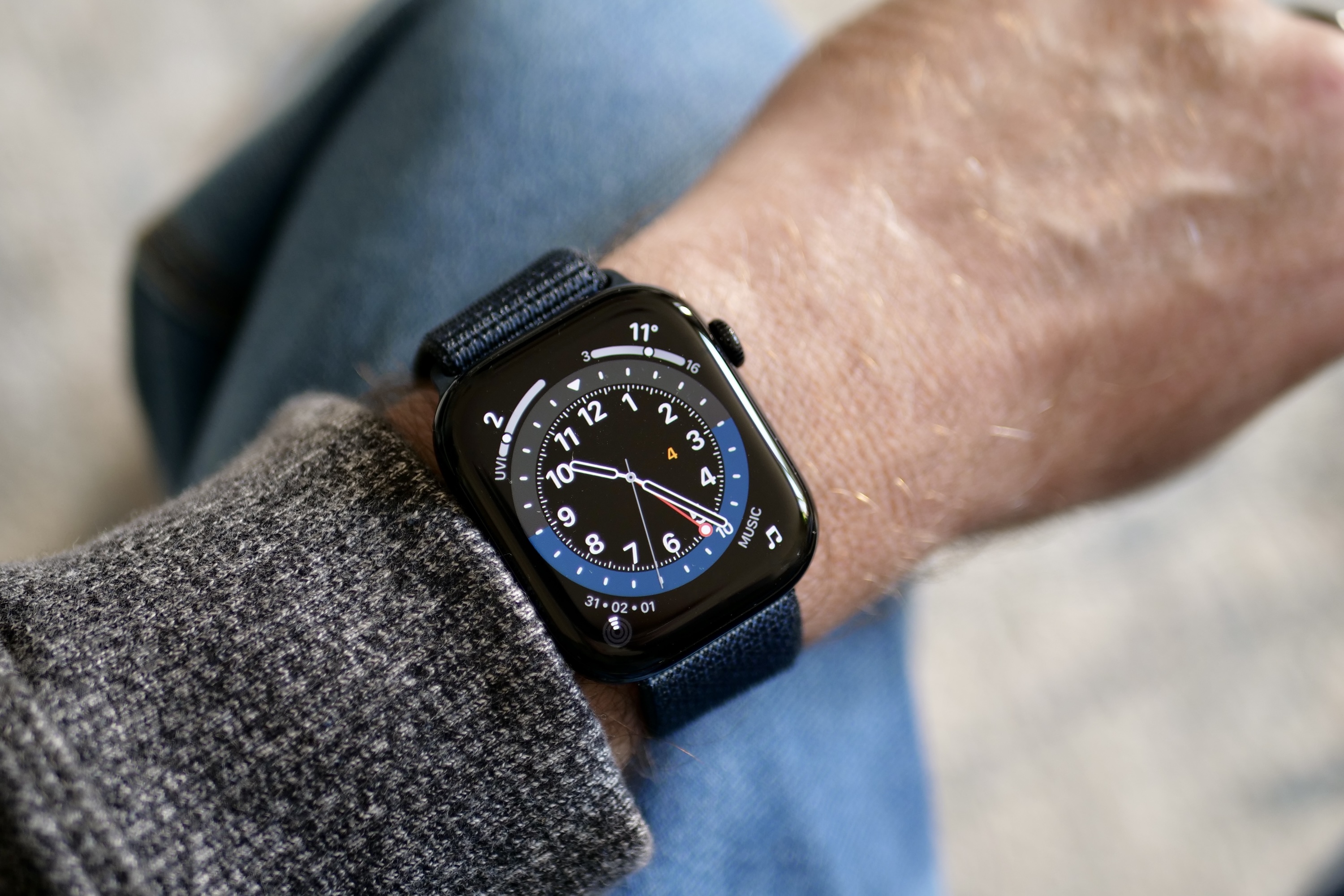 A person wearing the Apple Watch Series 10.