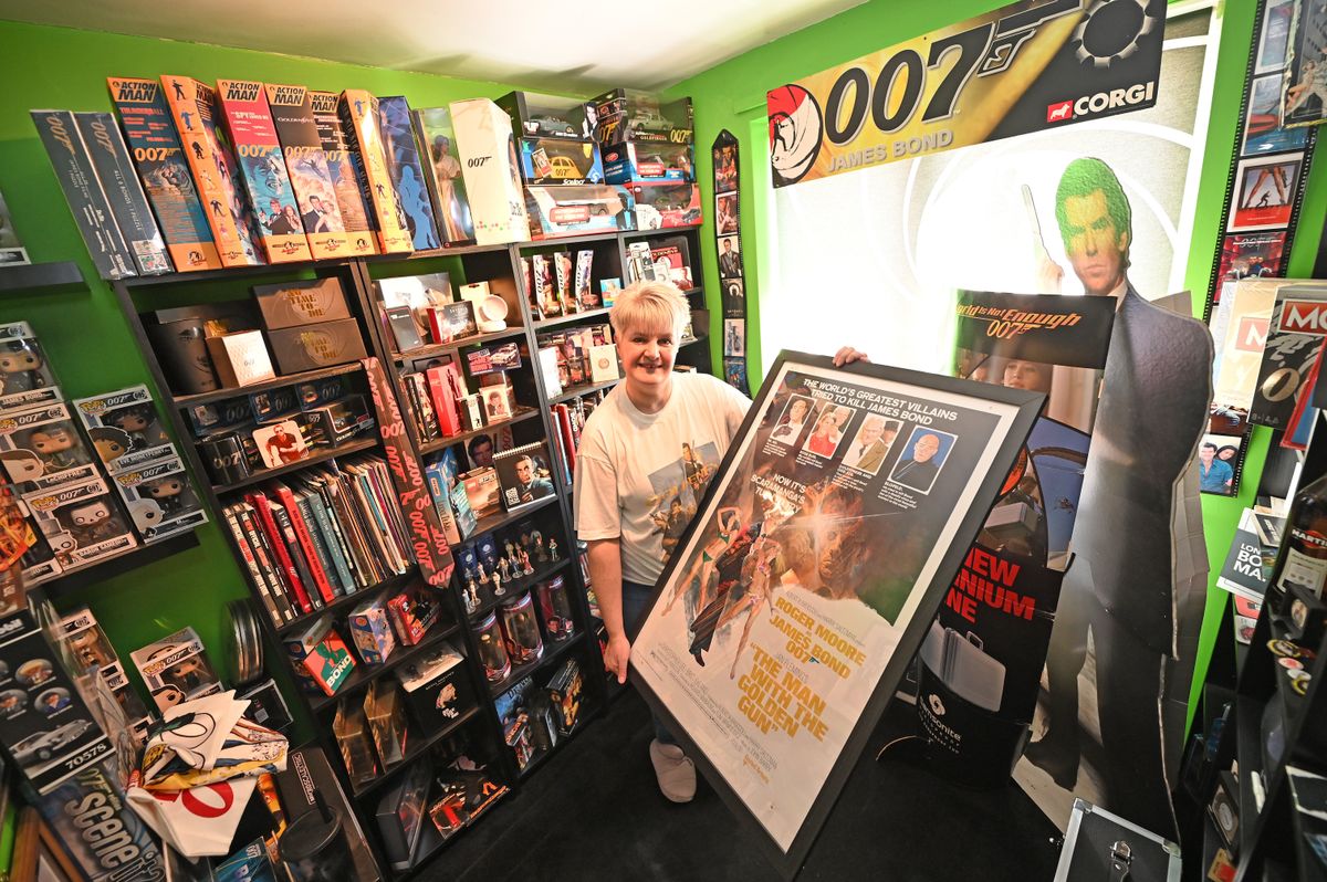 Vicky with the oldest item in her collection
