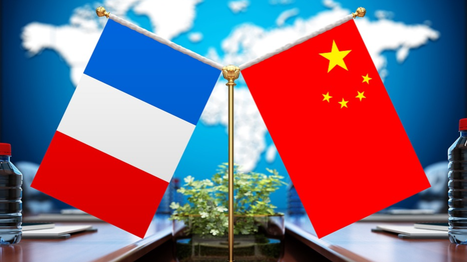 China ready to work with France to safeguard economic, trade environment