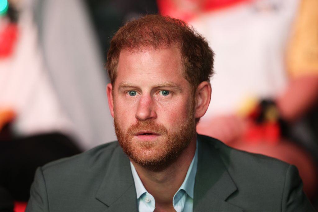 Prince Harry, Duke of Sussex watches the show during the opening ceremony of the Invictus Games 