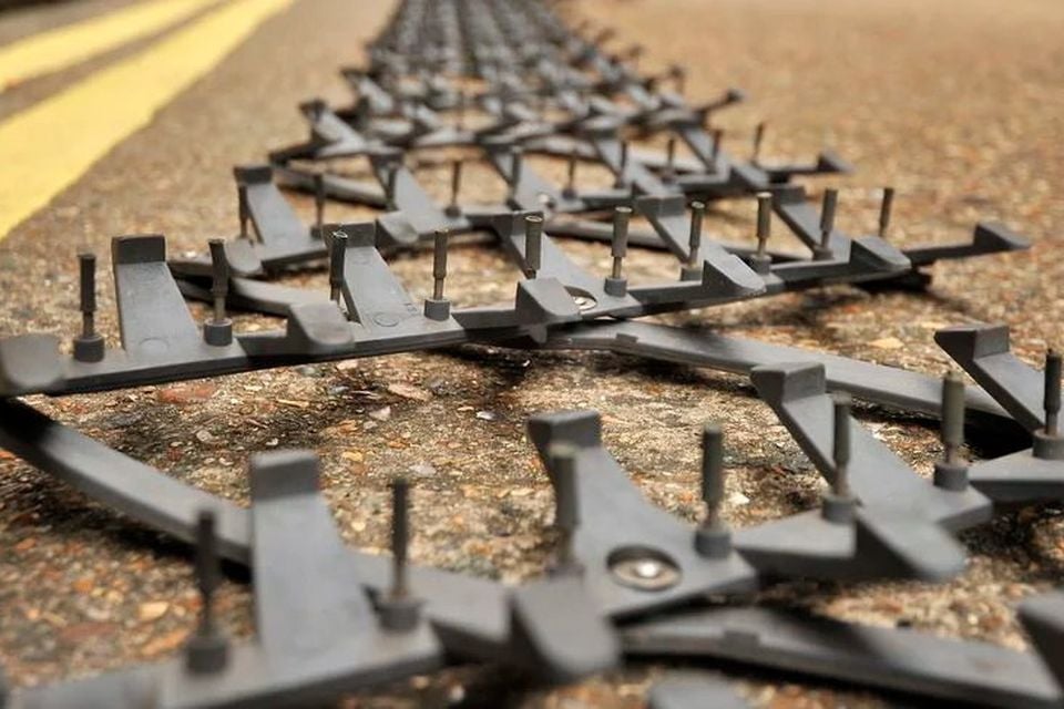 A Police stinger spike strip (Andrew Matthews/PA)