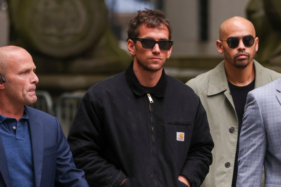 Alex Fine leaving a federal courthouse.