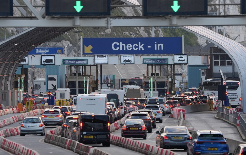 Cars queuing at a ferry check-in.
