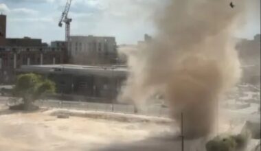 Terrifying moment 'dust DEVIL' rips through UK city centre bringing traffic to a standstill
