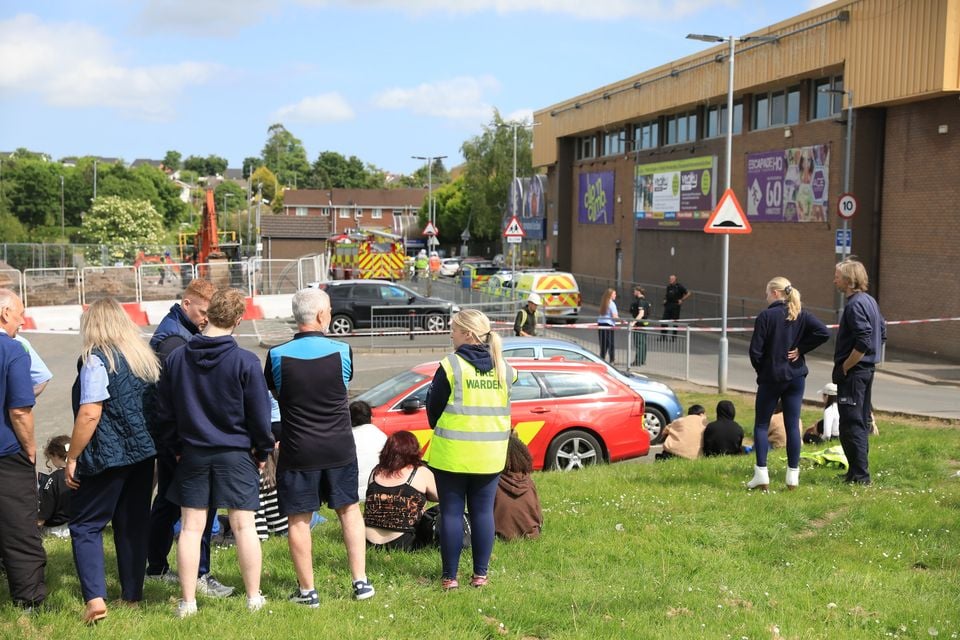 People look on as Emergency Services arrive at the scene of an ongoing incident at Dundonald Ice Bowl, Thursday, May 22, 2025.  (Photo by Peter Morrison)