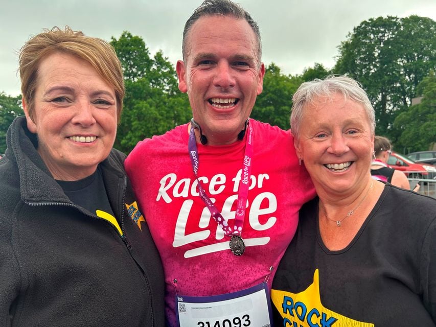Official starters left to right: Dawn Mackey and Avril Campbell pictured with Stephen Keane who ran the 10k on behalf of the Rock Choir and raised £2,000