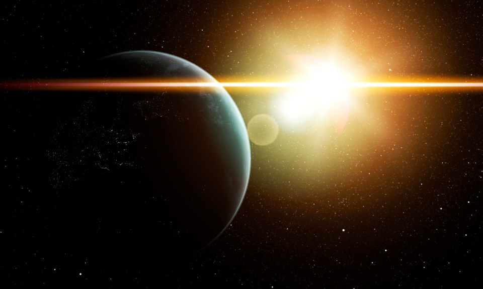 Computer artwork of Earth and the Sun.