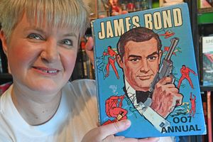 Vicky with the oldest item in her collection