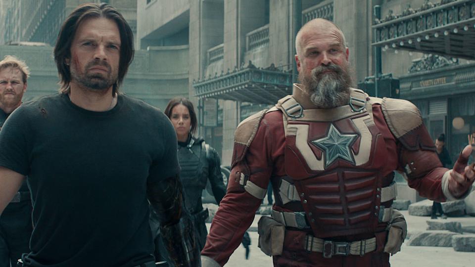  Bucky Barnes (Sebastian Stan) and Alexei Shostakov (David Harbour) walk with their teammates in Thunderbolts*. 
