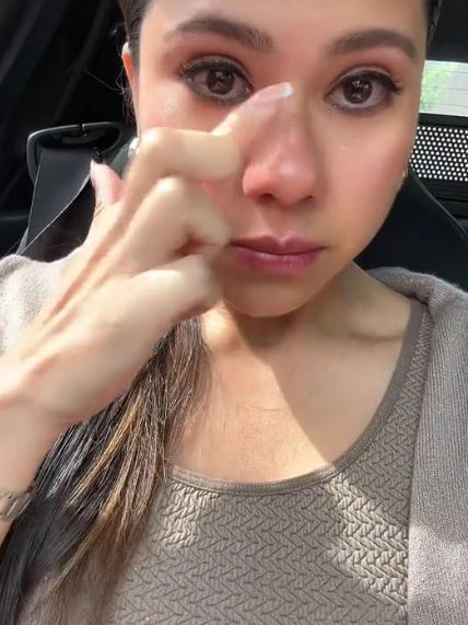 A woman crying.