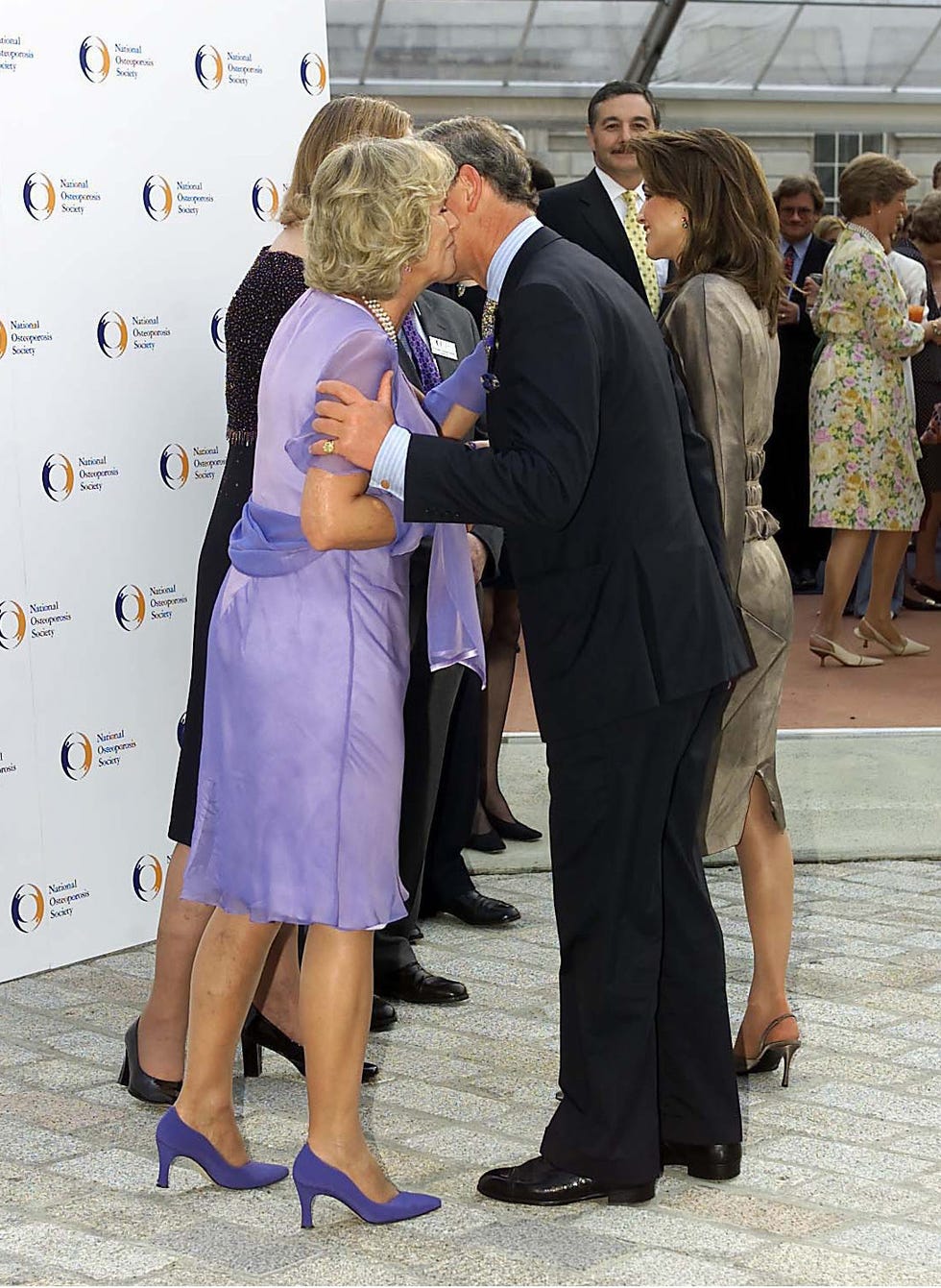 camilla parker bowles welcoming prince charles with a kiss