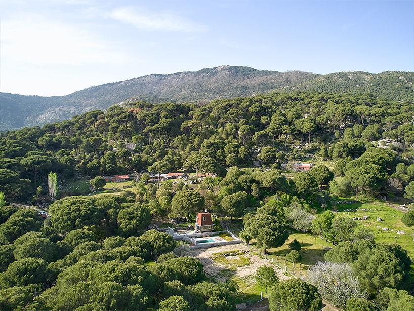 corten steel angular cabin emerges amongst pergamon forests in turkey