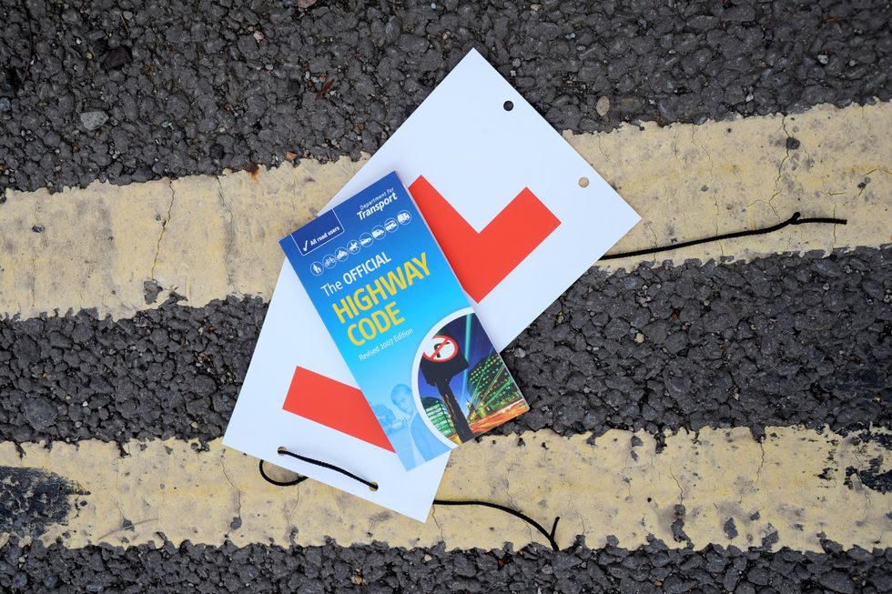 Highway Code and an L plate