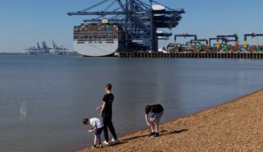 Container ships load and unload at Felixstowe Port, England