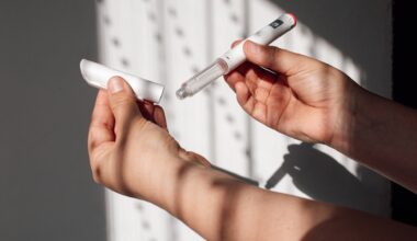 a person holds a GLP-1 injector