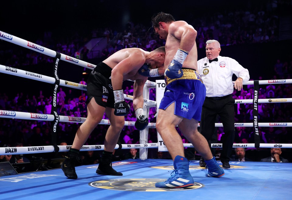 Allen dropped Fisher with a perfect combination and the latter lay motionless on the canvas