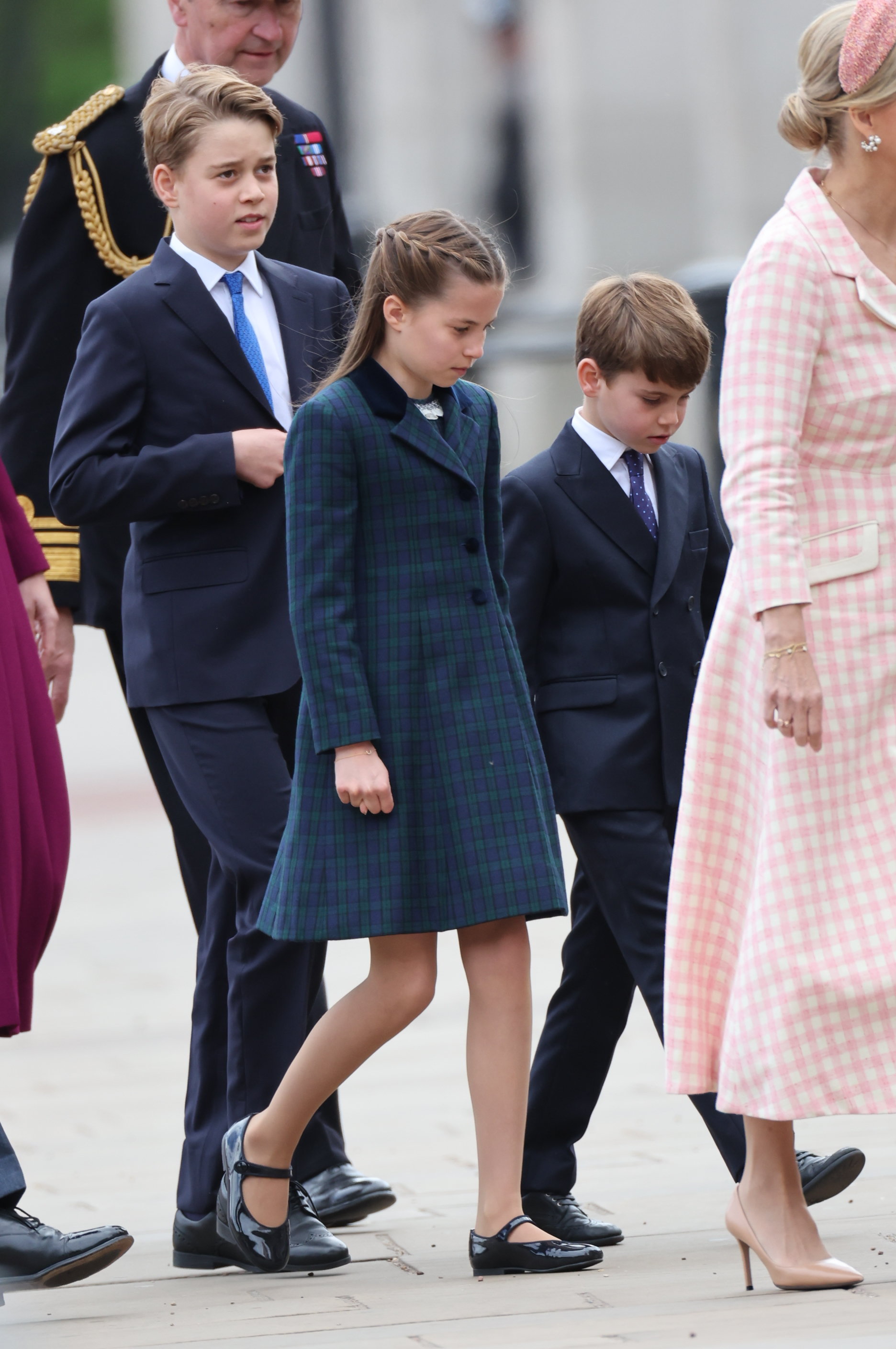 Prince George, Princess Charlotte, and Prince Louis arrive to the military procession and flypast.