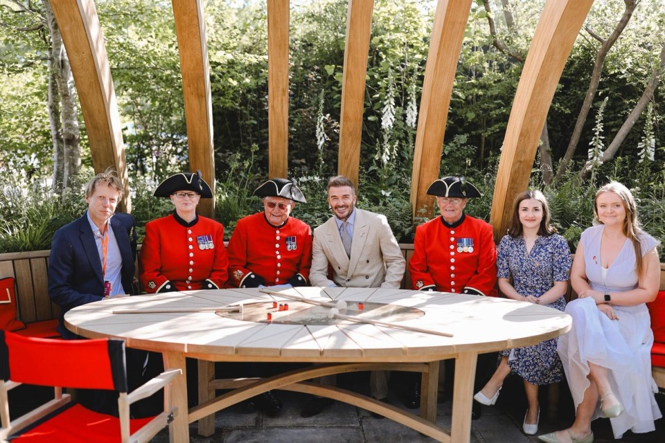 David Beckham with Chelsea Pensioners and others at the RHS Chelsea Flower Show.