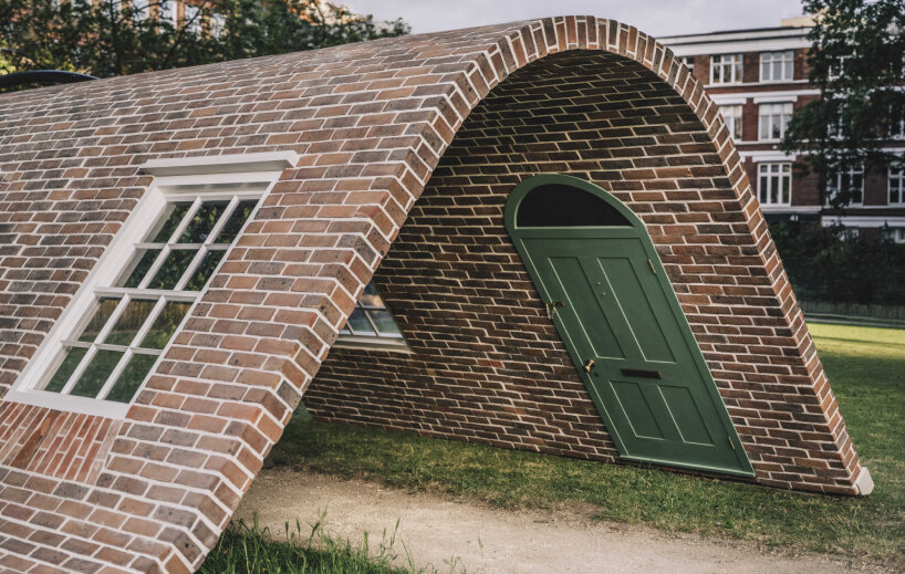 alex chinneck monumental brick facade sculpture