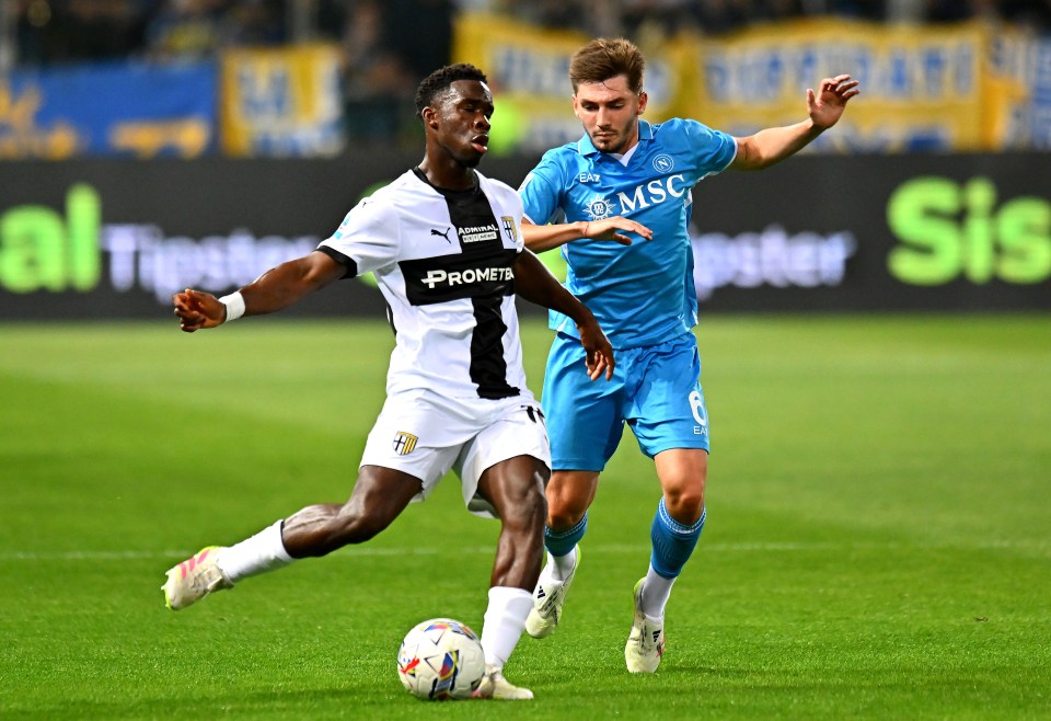 Mandela Keita of Parma Calcio passing the ball during a soccer match.