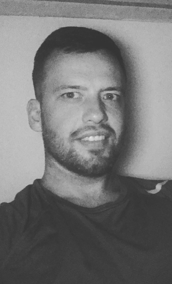 Black and white headshot of Mark Keel.