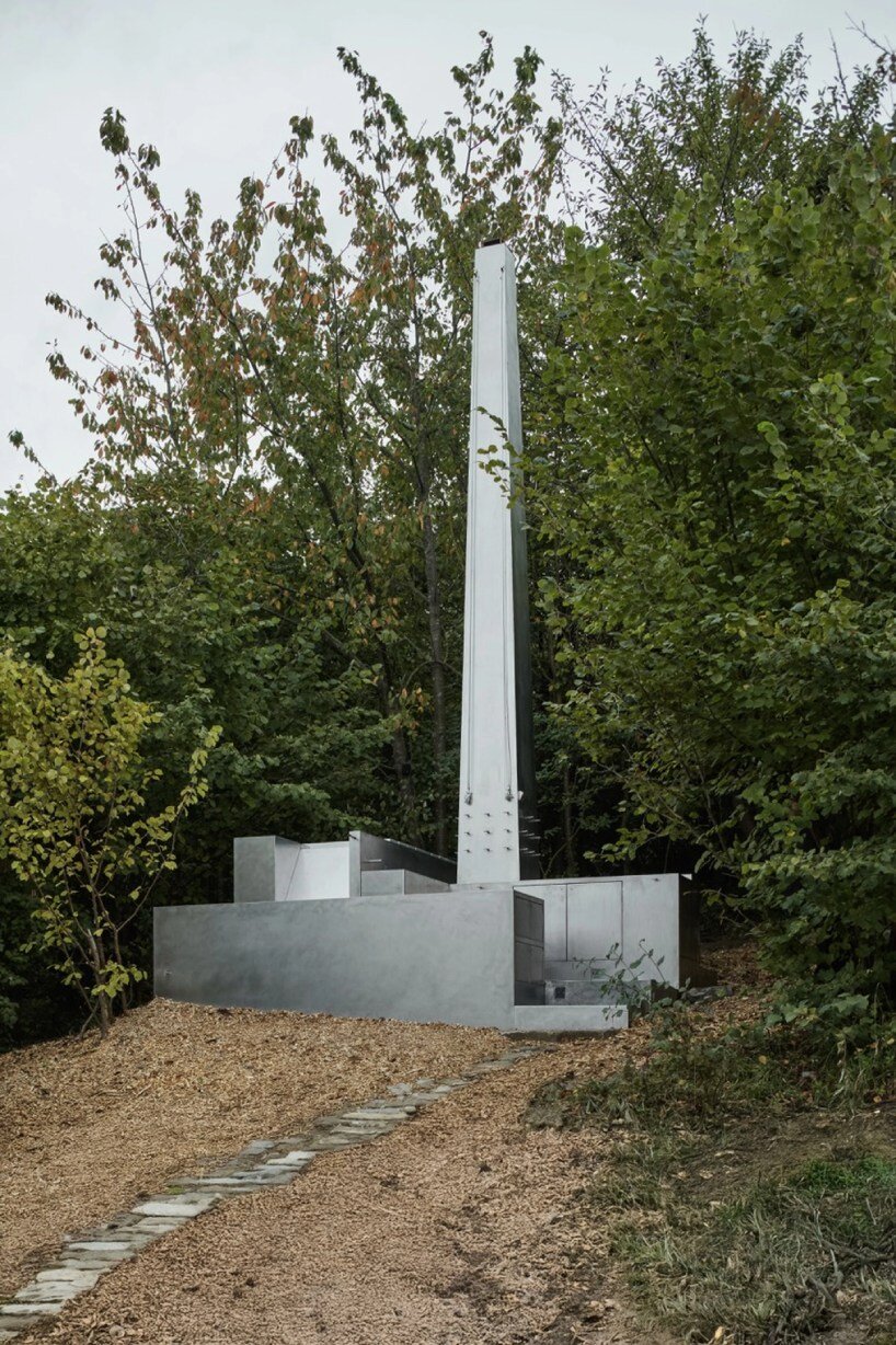 carrocerra collective's open-air steel house in italian forest reimagines ritualistic living