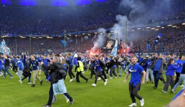 Shock moment fans storm pitch in huge invasion with 25 rushed to hospital as club wins promotion to Germany’s Bundesliga
