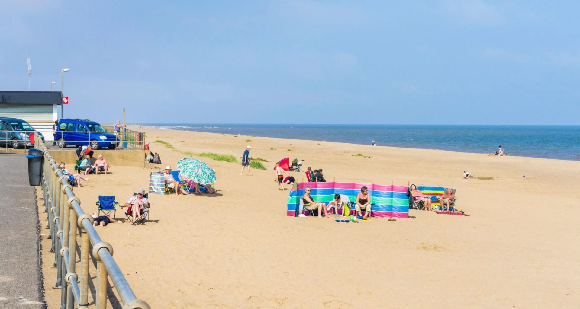 Man, 60, dies after 'getting into difficulty' in water while rescuing two 'distressed' children at popular UK beach