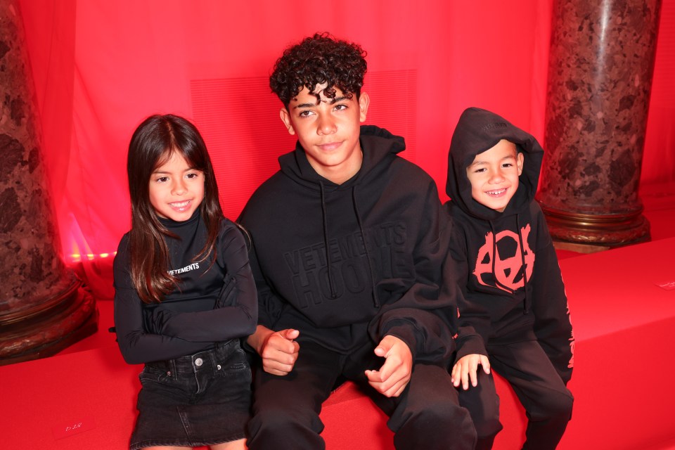 Ronaldo Jr is the eldest of his father's five children, and is pictured alongside two of them here, Eva Maria, and Mateo