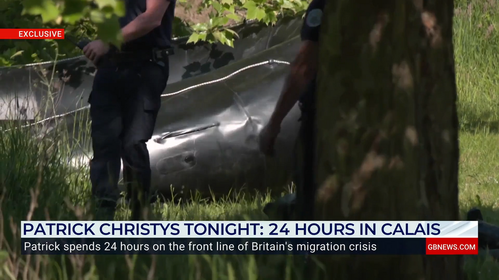 Officers slash an inflatable boat