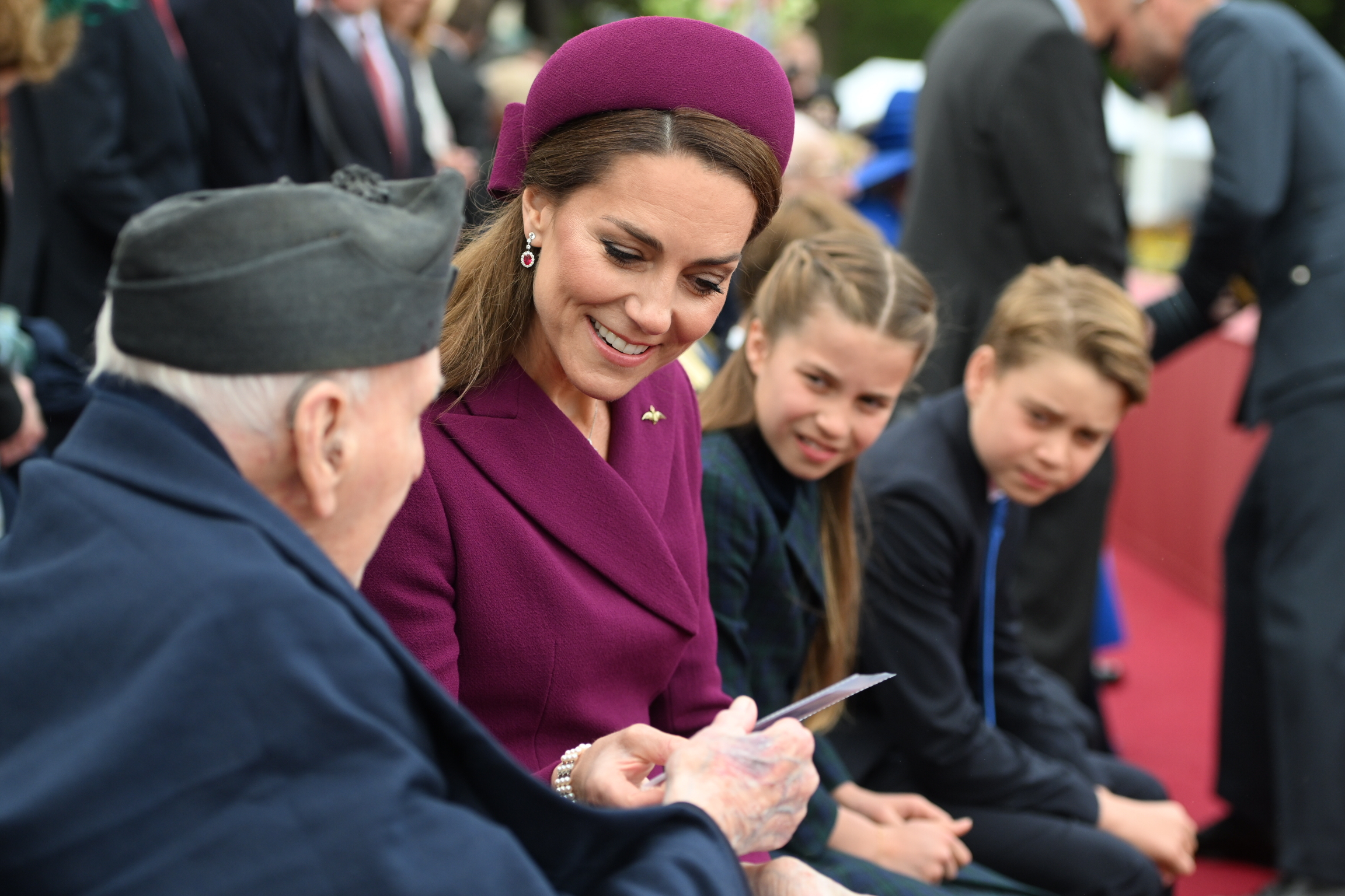 Kate Middleton greets an attendee.