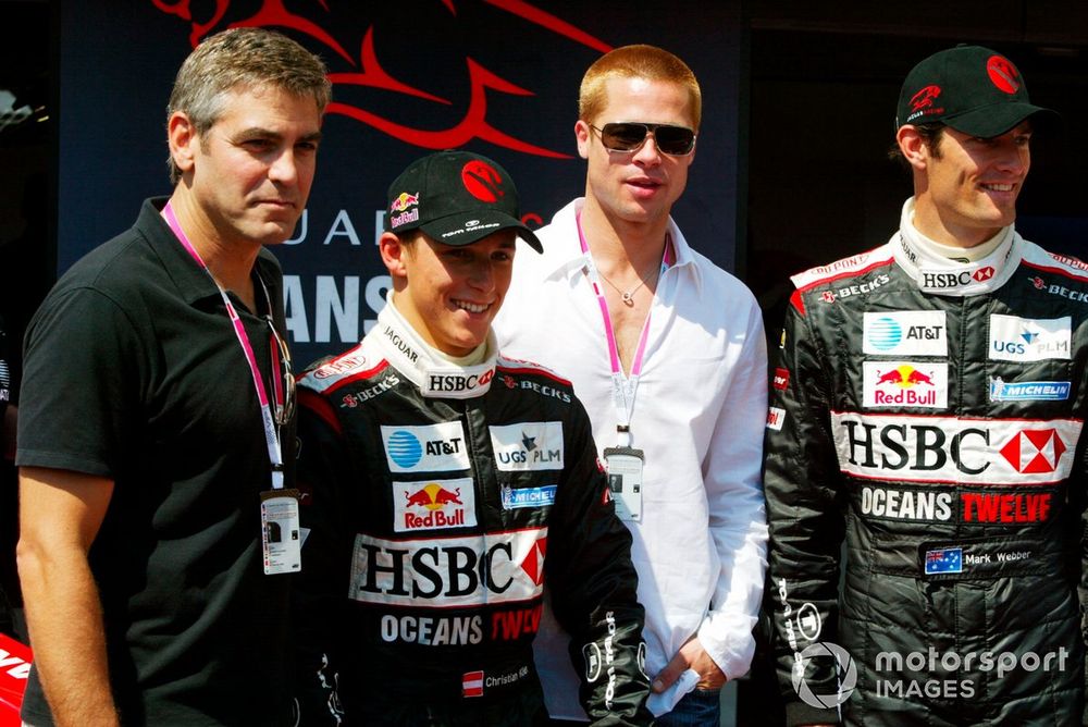 Promoting the film Oceans Twelve with the Jaguar team: George Clooney, Actor; Christian Klien, Jaguar; Brad Pitt, Actor; Mark Webber, Jaguar