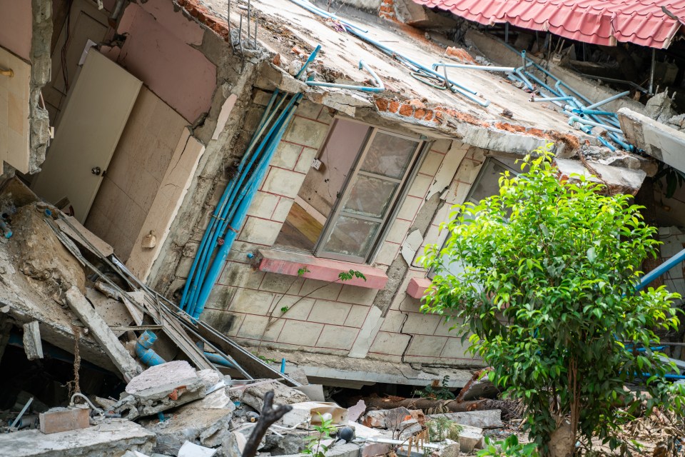 Damaged residential building in Naypyidaw, Myanmar after an earthquake.
