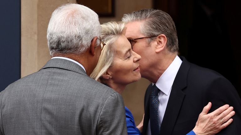 Britain's Prime Minister Keir Starmer kisses European Commission President Ursula von der Leyen as he greets her and European Council President Antonio Costa as they arrive to attend the UK-EU Summit at Lancaster House in London on May 19, 2025. HENRY NICHOLLS/Pool via REUTERS