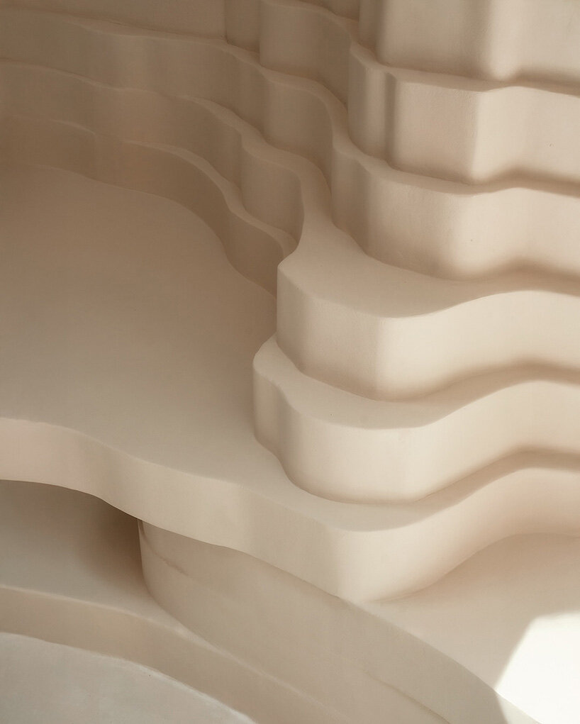 snarkitecture sculpts creamy contours into canyon-like athens burger spot