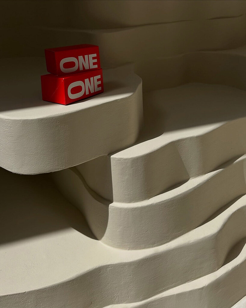 snarkitecture sculpts creamy contours into canyon-like athens burger spot