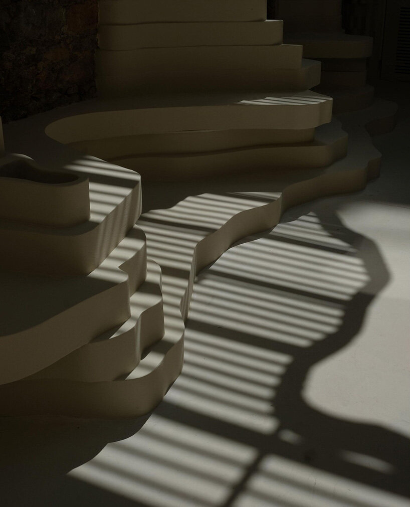 snarkitecture sculpts creamy contours into canyon-like athens burger spot