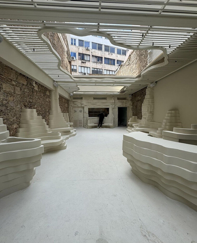 snarkitecture sculpts creamy contours into canyon-like athens burger spot