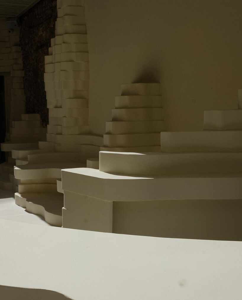 snarkitecture sculpts creamy contours into canyon-like athens burger spot
