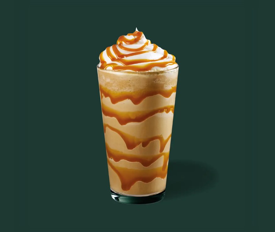 Starbucks Caramel Frappuccino with whipped cream and caramel sauce.