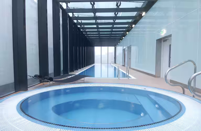 swimming pool and jacuzzi at hilton deansgate manchester hotel