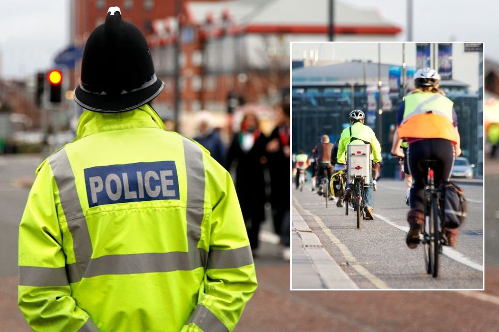 UK police officer and cyclists on a road