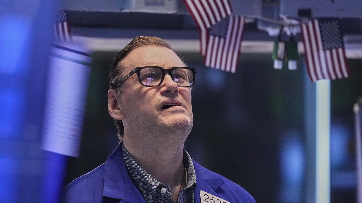 Wall Street gains ground following a stronger-than-expected report on the US job market