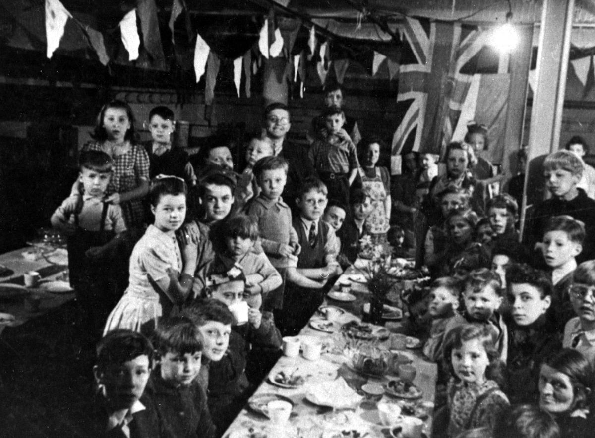 ve day celebrations children at party in Hulme in 1945