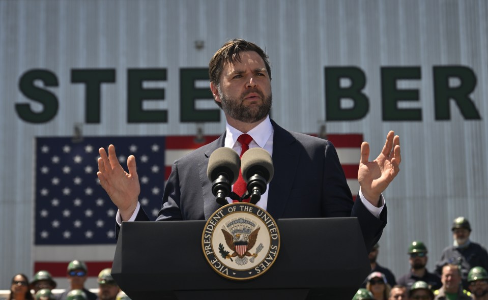 Vice President JD Vance speaking at a podium.