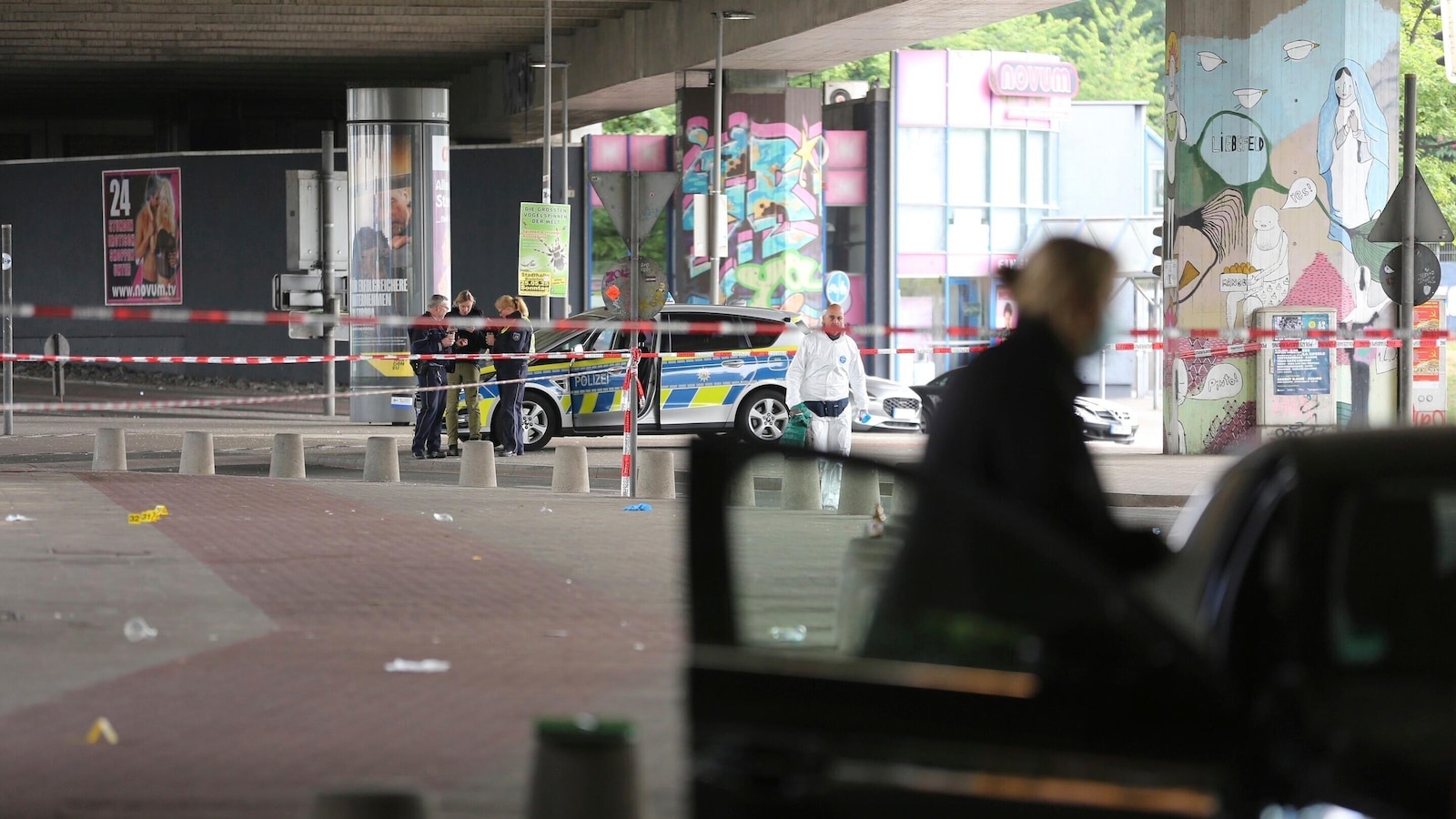 German police search for man who attacked and injured several people outside a bar