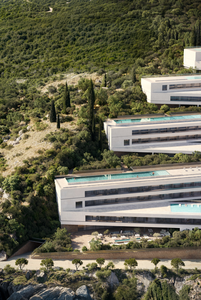 zig-zag resort extends linear terraces and infinity pools along albania’s rugged coastline